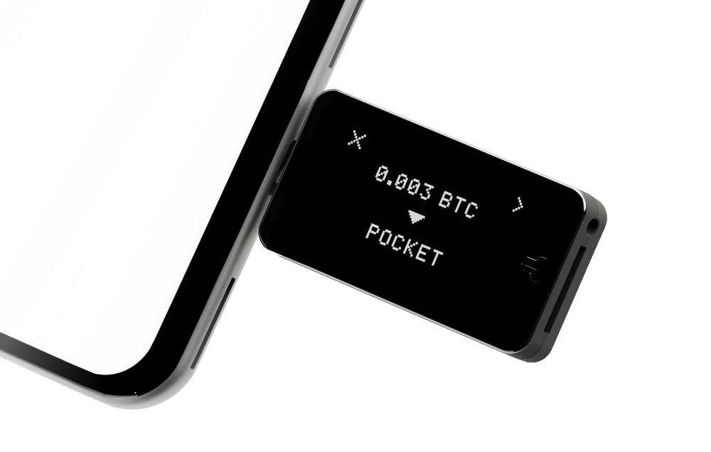 Digital Shield hardware wallet connected to a phone
